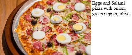 Eggs and salami pizza with onion green pepper and olive